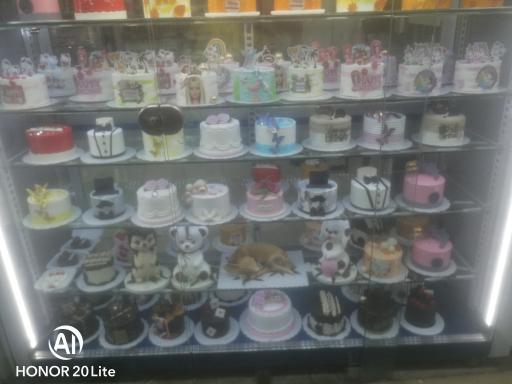 عکس شیرینی فروشی شاهکار