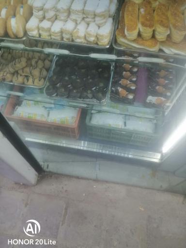 عکس شیرینی فروشی شاهکار