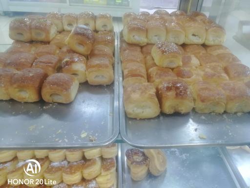 عکس شیرینی فروشی شاهکار