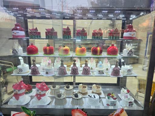 عکس شیرینی فروشی شاهکار