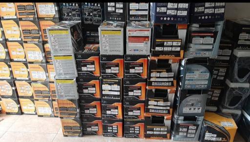 عکس باتری و لاستیک فروشی صادقی