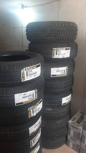 عکس باتری و لاستیک فروشی صادقی