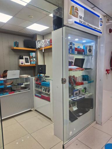 عکس فروشگاه یونی تک