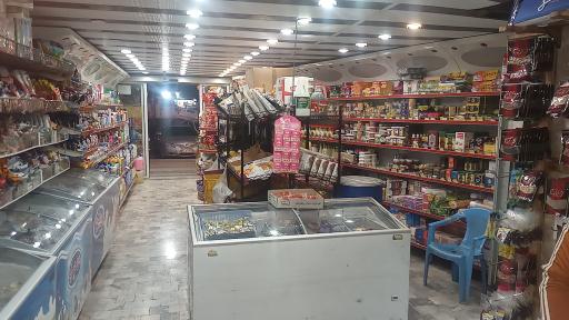 عکس فروشگاه مواد غذایی ودخانیات شمال