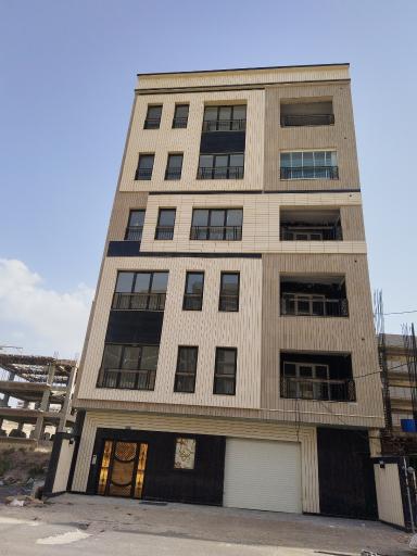 عکس ساختمان مسکونی رها