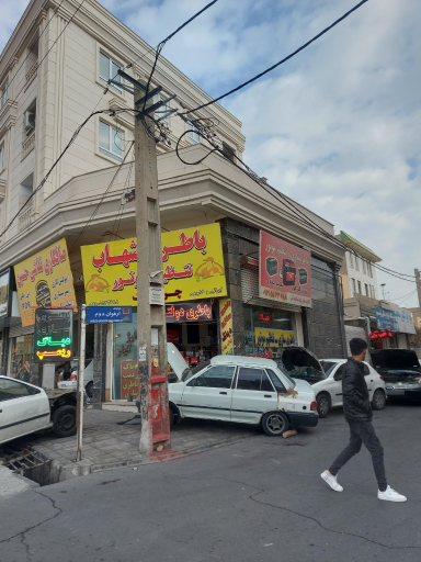 عکس باطری شهاب باطریسازی و تنظیم موتور