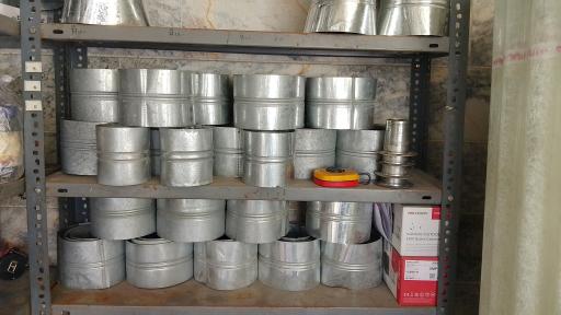 عکس فروشگاه ایرانیت و لوله‌ های سیمانی رضایی