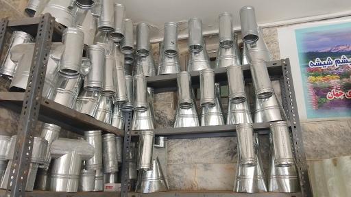 عکس فروشگاه ایرانیت و لوله‌ های سیمانی رضایی