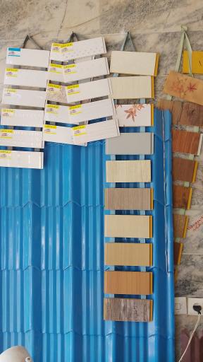 عکس فروشگاه ایرانیت و لوله‌ های سیمانی رضایی