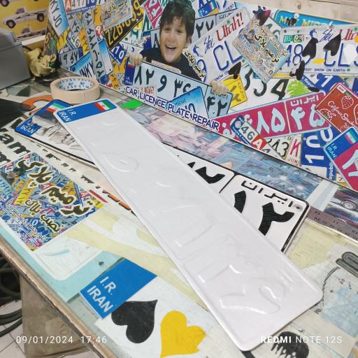 عکس ترمیم پلاک اتومبیل فرزاد