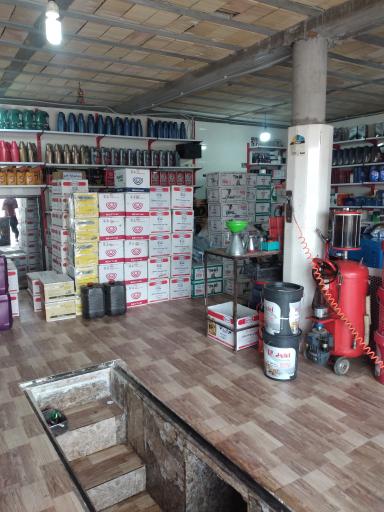 عکس تعویض روغن اتوسرویس برادران قنبری