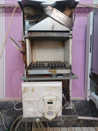 عکس تعمیرات تخصصی انواع پکیج دیواری 