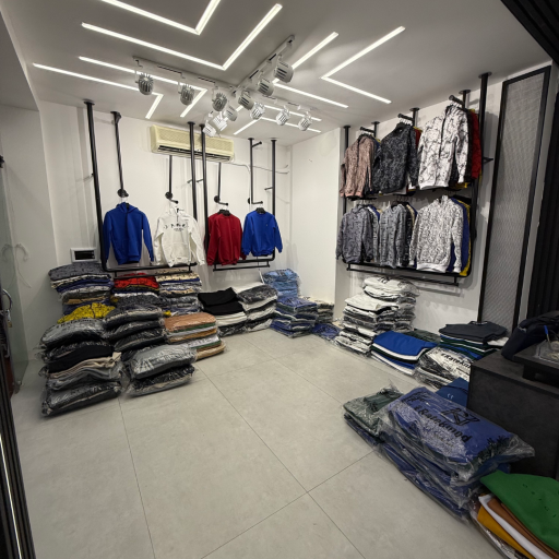 عکس تولید و پخش پوشاک مردانه راتک