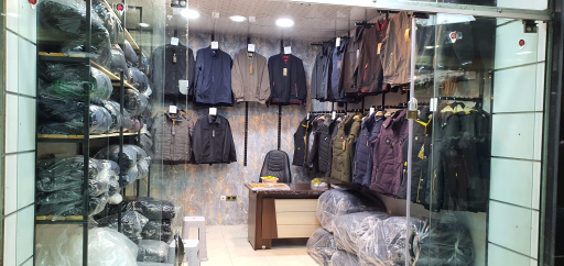 عکس تولید و پخش پوشاک مردانه راتک