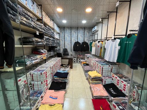 عکس تولید و پخش پوشاک مردانه راتک