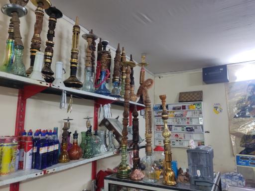 عکس زغال و دخانیات تاج