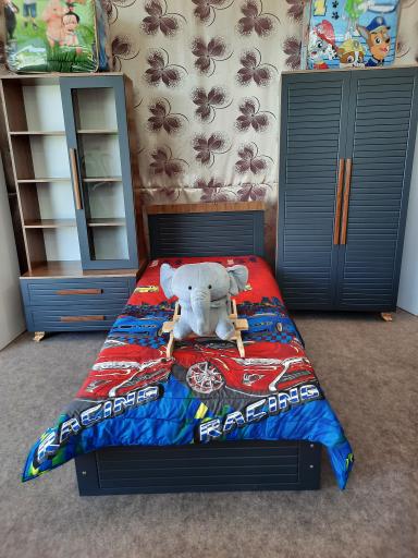 عکس تولیدی تخت و کمد نوزاد پوما (سیسمونی)