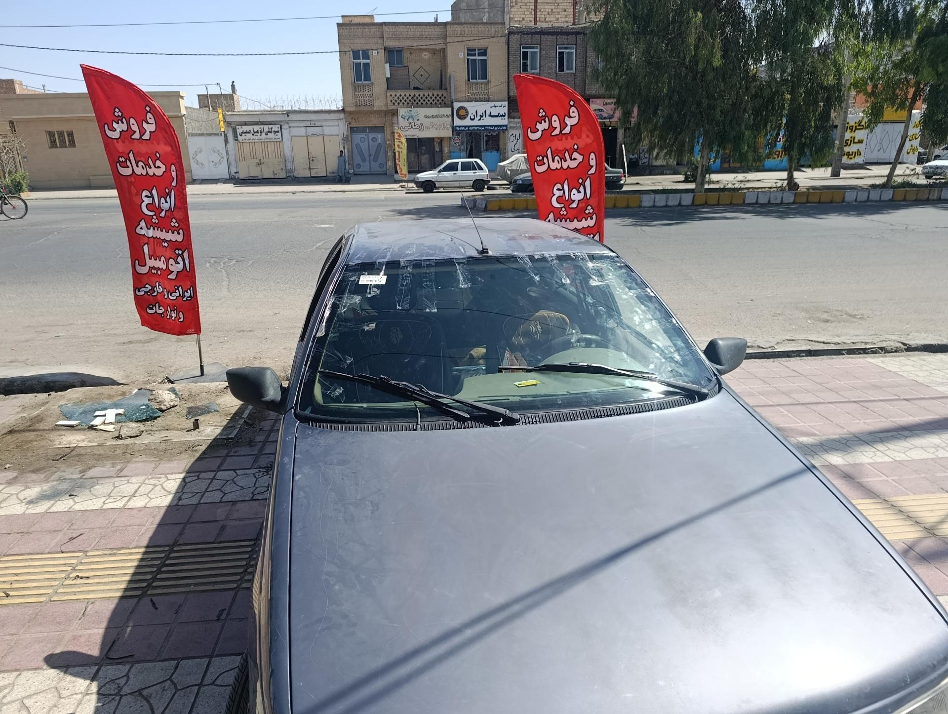 عکس شیشه اتومبیل قاسمی 