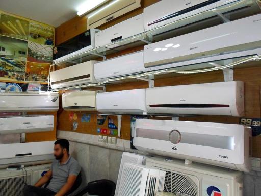 عکس تعمیر کولرگازی و پکیج و آبگرمکن