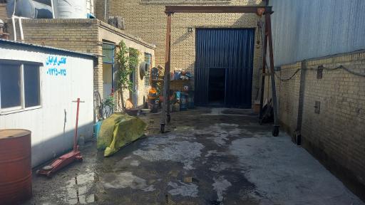 عکس کارگاه تعمیرات ماشین آلات راهسازی