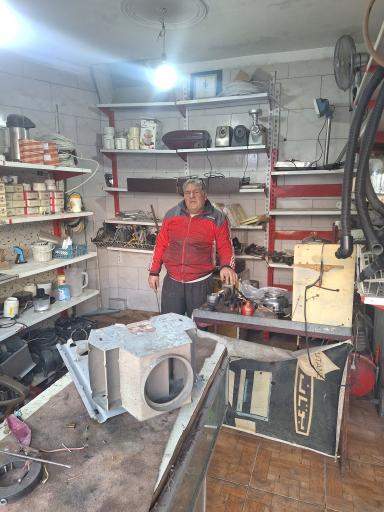 عکس تعمیر لوازم خانگی بخاری آبگرمکن سامان شعله