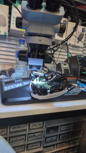 عکس تعمیرات موبایل و نصب بازی کنسول معین