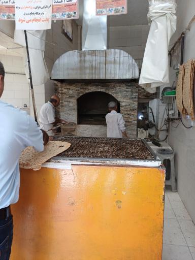 عکس نانوایی سنگک ماشینی