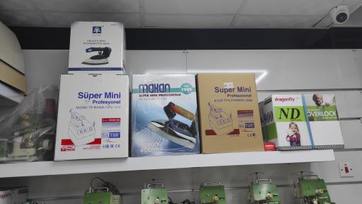 عکس فروشگاه چرخ خیاطی آرمینا