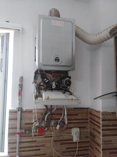 عکس تعمیرات انواع پکیج دیواری 