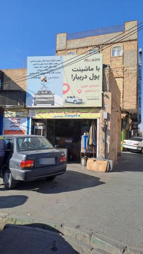 عکس تعمیر انواع قفل و شیشه بالابر برقی