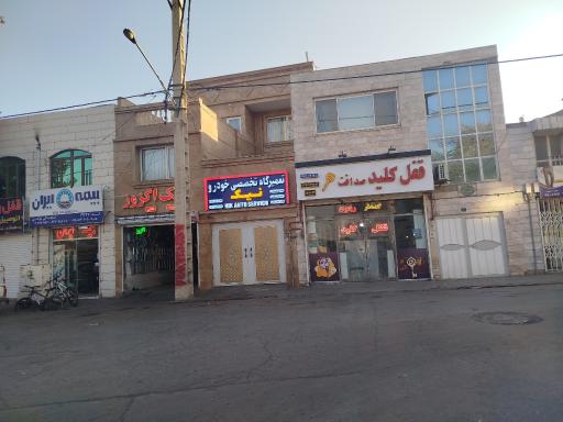 عکس خدمات خودرویی نیک اگزوز