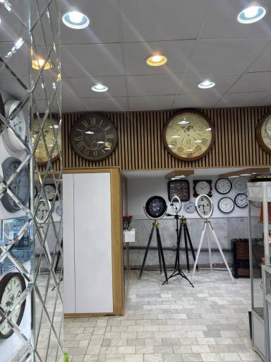 عکس تعمیرات و فروشگاه شهر ساعت
