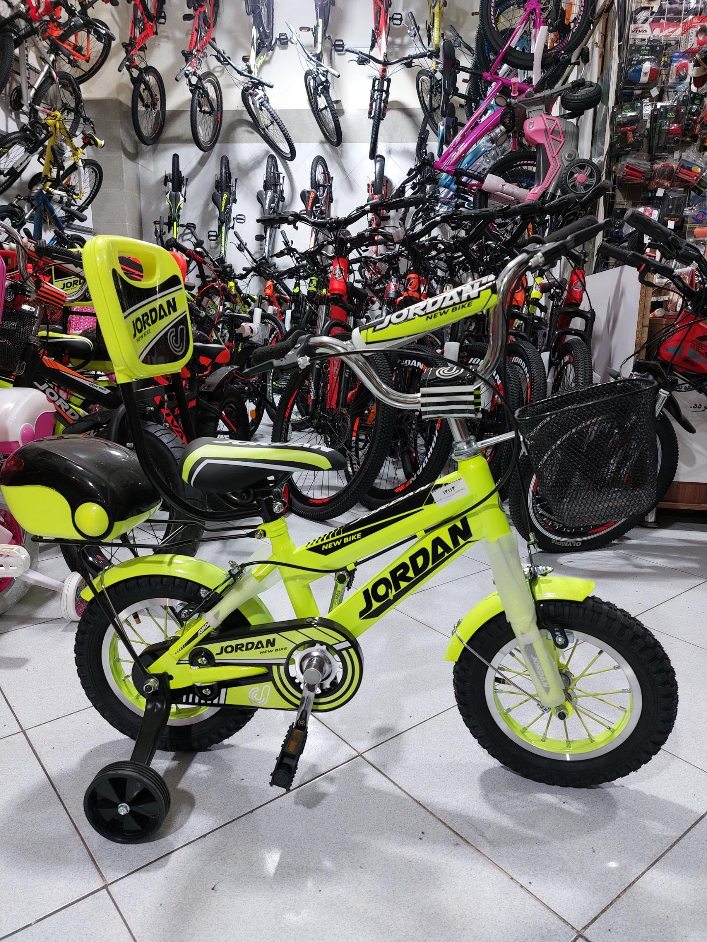 عکس فروشگاه دوچرخه و ماشین شارژی فارسی