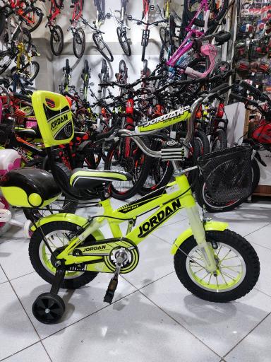 عکس فروشگاه دوچرخه و ماشین شارژی فارسی