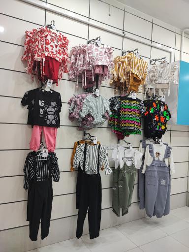 عکس پوشاک بچه رئیس شعبه ۲