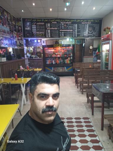 عکس پیتزا ساندویچ اغذیه سنتي عمو جهان