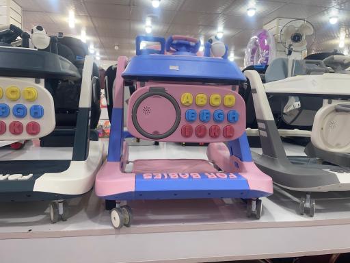 عکس فروشگاه سیسمونی دنیای کودک افق