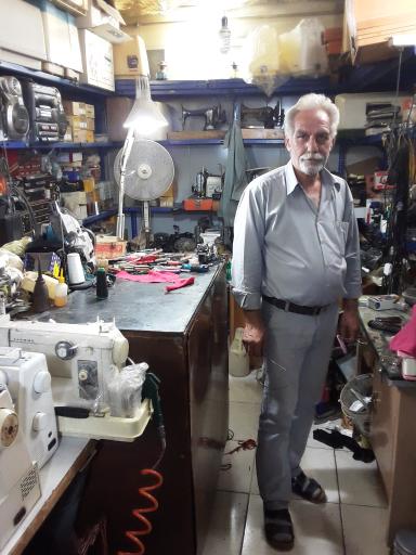 عکس تعمیر چرخ خیاطی وزیری