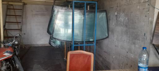 عکس شیشه خم اتومبیل ایرانمنش