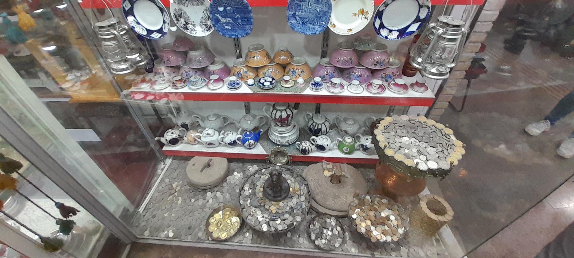 عکس عتیقه فروشی