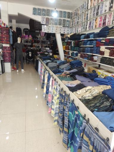 عکس فروشگاه پوشاک و لوازم جانبی موبایل بتا