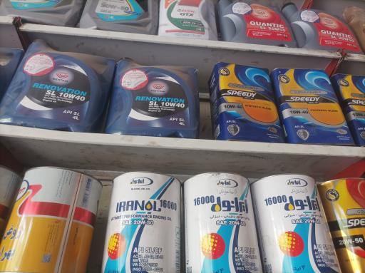 عکس تعویض روغن علی کشاورز