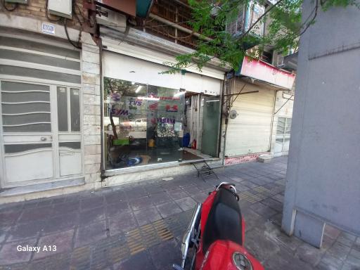 عکس تعمیرگاه موتور سیکلت قزل
