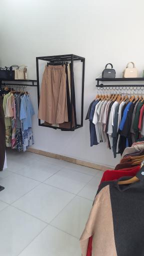 عکس فروشگاه لباس مادوریس