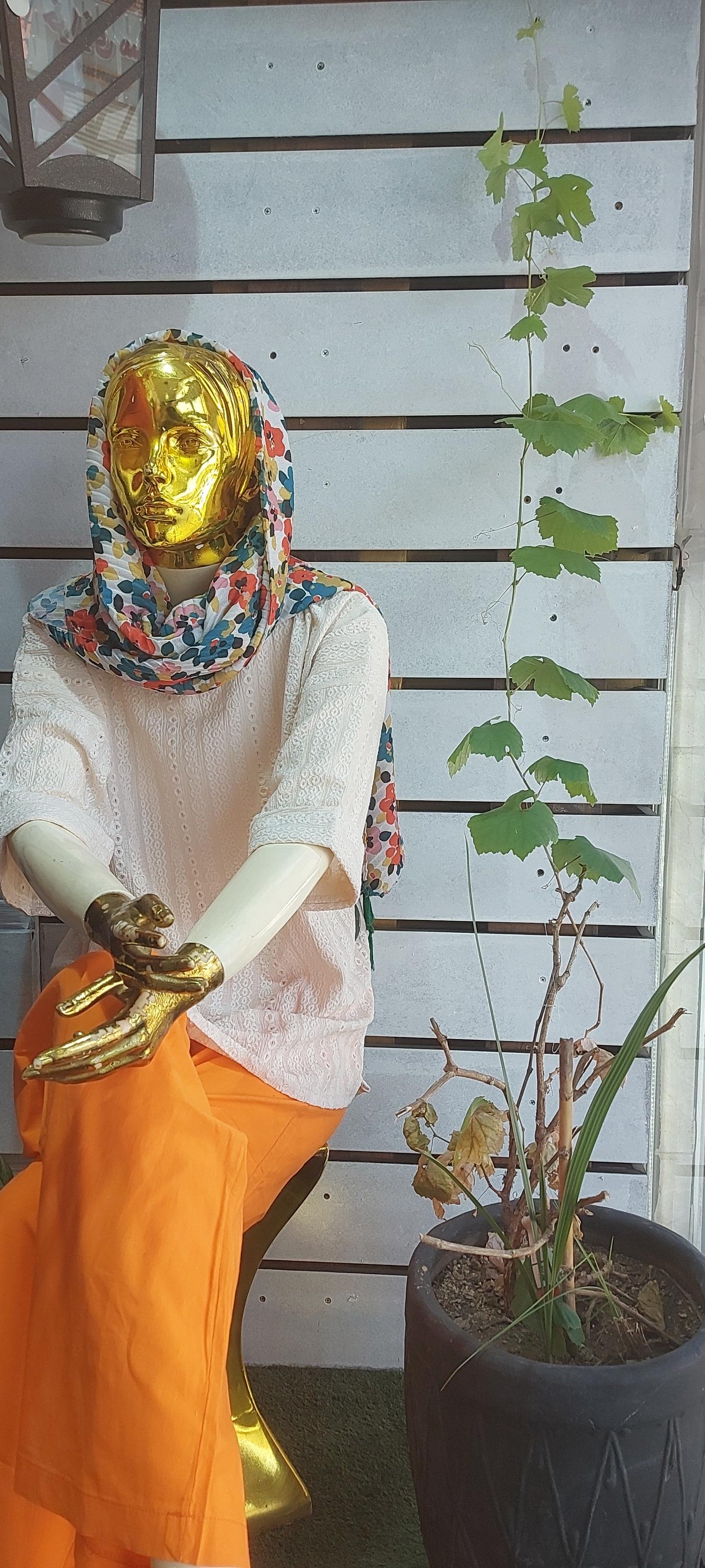 عکس فروشگاه البسه تاپ و توپ