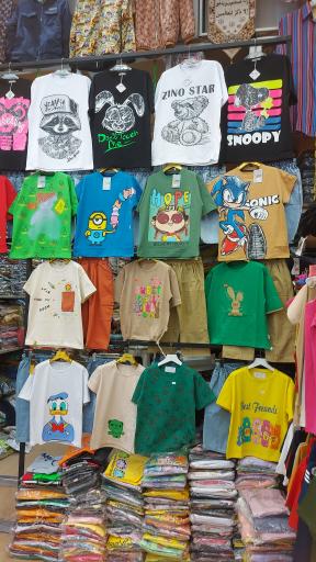 فروشگاه البسه تاپ و توپ