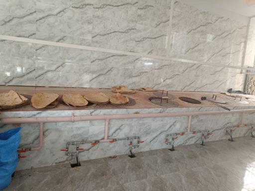 عکس نانوایی سنتی عالیجناب