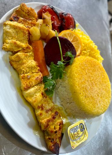 عکس تهیه غذای ته دیگ