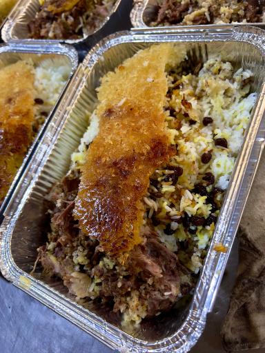 عکس تهیه غذای ته دیگ