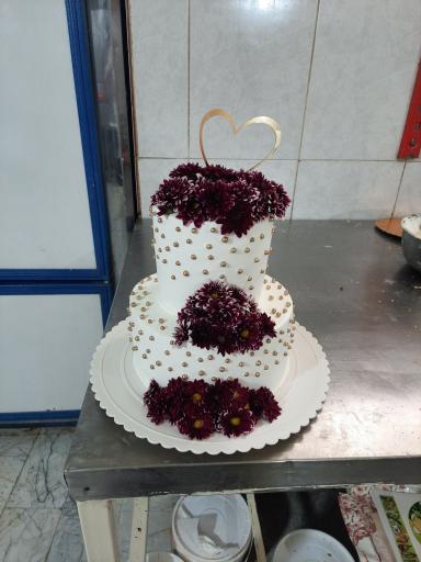 عکس شیرینی فروشی مهدی